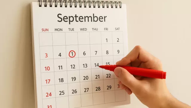 Calendario de septiembre con el día 1 marcado en rojo, simbolizando un nuevo comienzo.